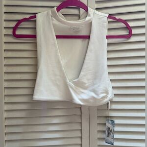 Frankie’s Bikinis White top size L.